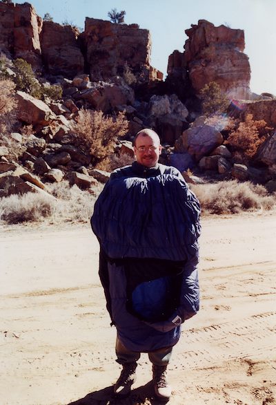 2001 March Charles and Sleeping Bag in El Malpais