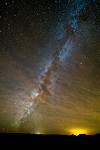 Stars and Milky Way fill the sky - a black skyline is broken by the shapes of Wotans Throne and Vishnu Temple.