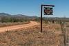 2020 June Empirita Ranch Sign on the Empirita Ranch Road with the Santa Rita Mountains in the Background