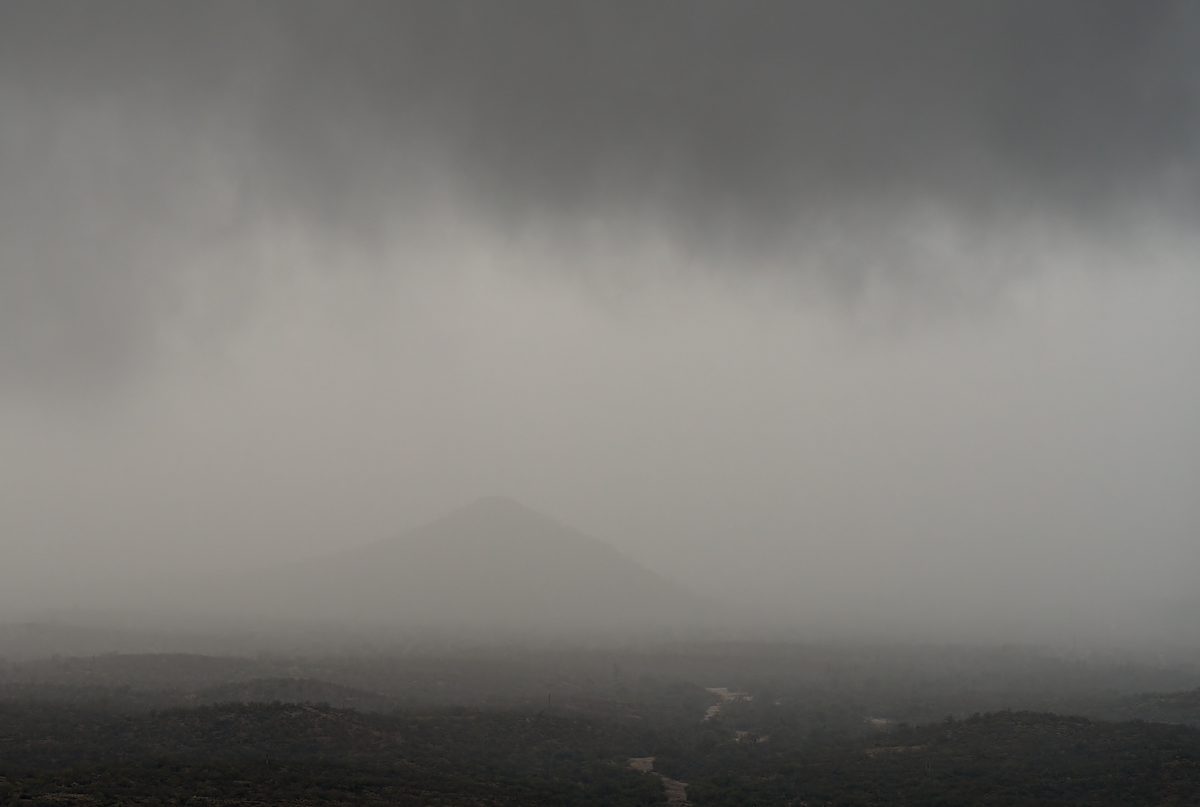 2026 January Sentinel Butte Disappearing in the Clouds