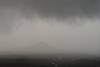 2026 January Sentinel Butte Disappearing in the Clouds